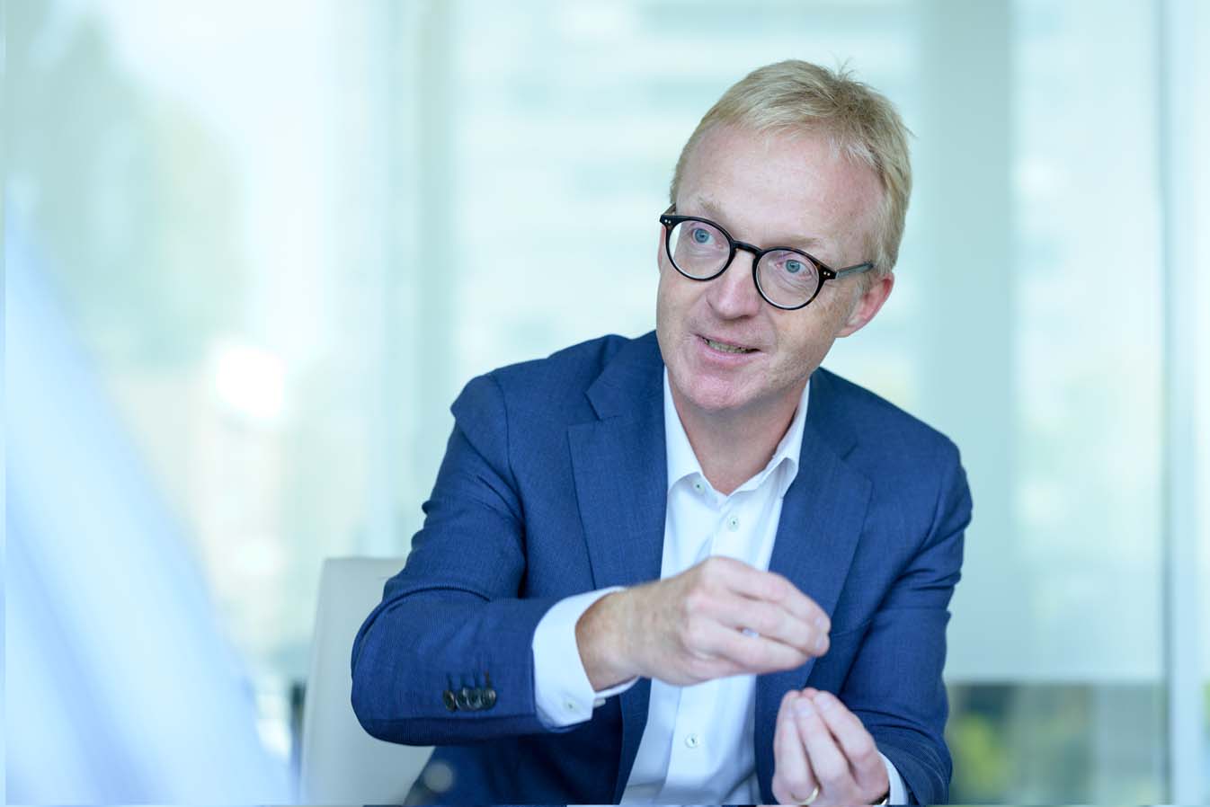 Picture of Bernard Perritaz when he is in a discussion